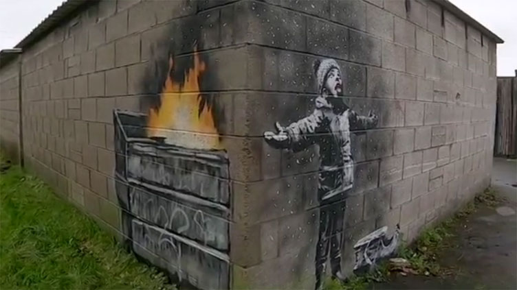 Una nuova opera di Banksy compare in Galles: un augurio di “buone feste” contro l'inquinamento