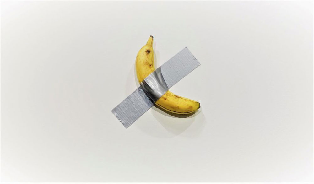 Una banana attaccata alla parete con nastro adesivo. La nuova opera di Cattelan per Art Basel Miami Beach